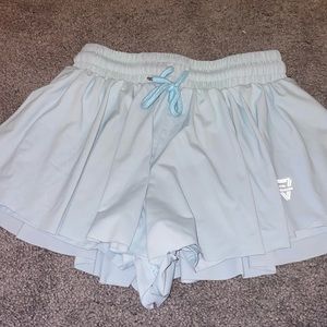 butterfly shorts and a in blue color and size small girls athletic wear.